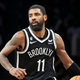 Brooklyn Nets guard Kyrie Irving (11) dribbles against the Chicago Bulls during the second half of an NBA basketball game Tuesday, Nov. 1, 2022, in New York.